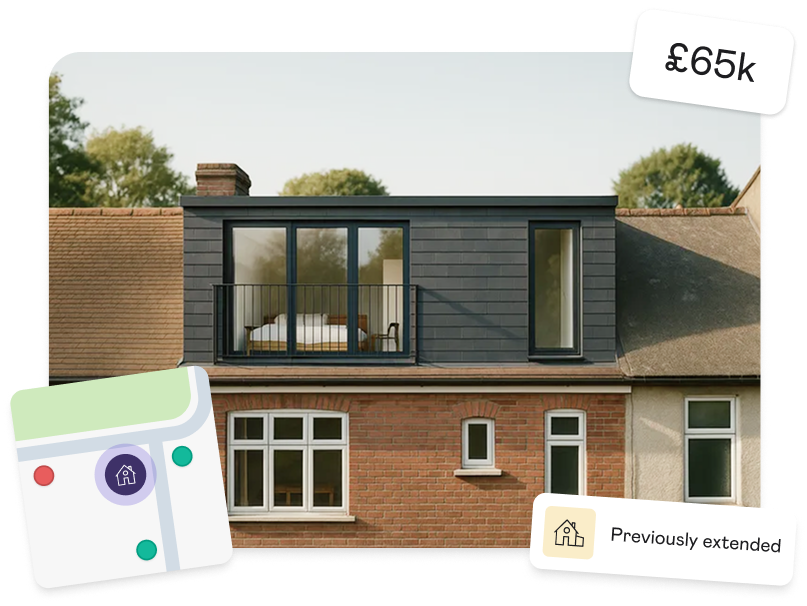 Loft conversion with modern cladding and large windows